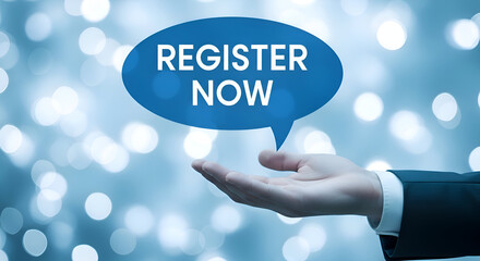Suit clad hand presenting a blue speech bubble that reads 'register now' on a bokeh light background, signifying business promotion or event registration