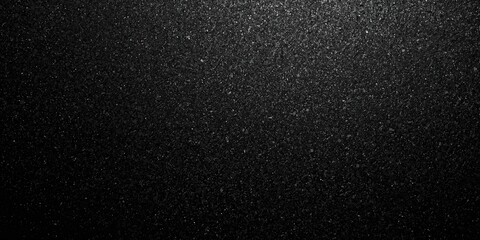 Black glitter textured patterned background used for graphic design layouts
