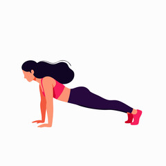 A fit woman with dark hair performs a plank exercise, strengthening her core muscles in a healthy lifestyle activity.