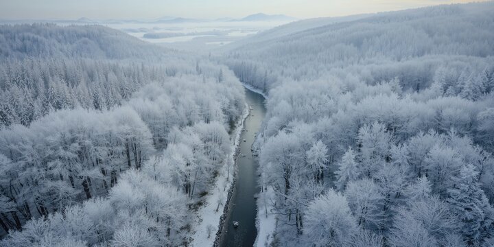 Bird's-eye perspective of snow-covered Poprad Landscape Park in Beskid Sadecki during winter, emphasizing seasonal change