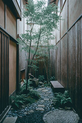 Serene narrow Japanese courtyard with stone path, cedar walls, and lush greenery, a zen small-space garden ideal for wellness and minimalist design themes