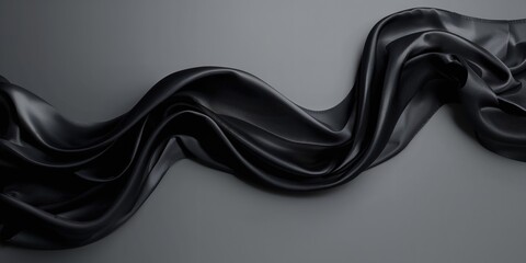 Black and gray satin fabric with a shiny surface, abstract patterns and soft blurred waves, suitable for textile design backgrounds
