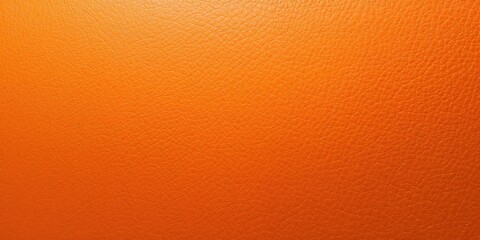 Naklejka premium Macro shot of artificial orange leather surface with textured pattern, suitable for UI backgrounds or editorial headers, Earth Day