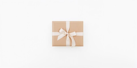 Gift box wrapped in craft paper and tied with a white ribbon on a white background, suitable for minimalist holiday gift presentations