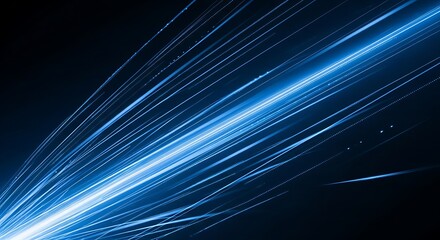 Abstract light trails in blue against black background with diagonal lines
