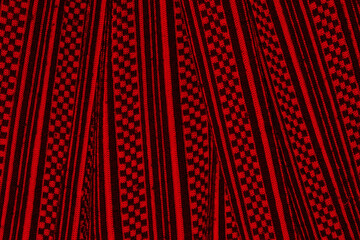 Shirt fabric texture or background with black and red checks.
