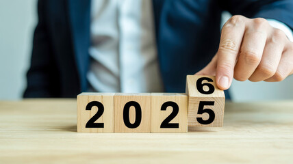 Changing the year 2025 to 2026 on wooden blocks