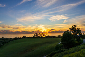 Fototapeta premium A gorgeous sunset over the pacific ocean at Pelican Hill in Newport Beach California USA