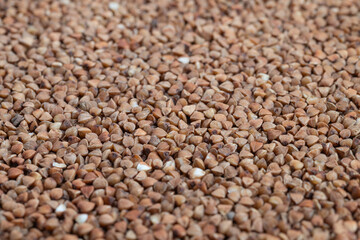 Traditional country cooking highlighted by organic buckwheat kernels, Authentic homemade atmosphere featuring elegantly arranged organic buckwheat from traditional recipes