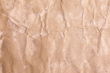 Crumpled paper texture with dirty brown stains