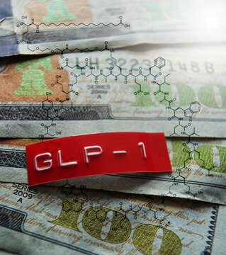 GLP-1 label and semaglutide molecule structure on assorted one hundred dollar bills