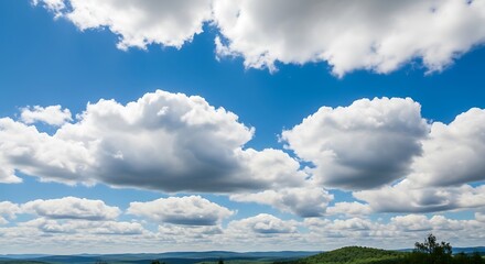 Dramatic Cumulus Clouds Over Rolling Hills, Bright Blue Sky, Summer Day.
