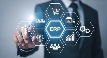 Businessman interacting with erp system interface with various business icons and graphs in a modern digital workspace