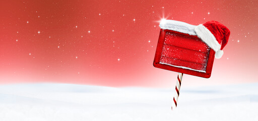 Rotes Weihanchtsschild vo einem Toten Hintergrund