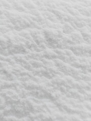 White snow background. Cloud Dancer trendy Color of the Year for 2026. Ice backdrop. Cold weather. Mery Christmas card. Frost texture. Icy Covering. Frozen winter. Close up. Frosty textured effects.