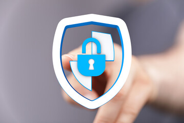 Concept of cybersecurity, data protection, and online safety. Featuring a hand interacting with a digital shield and padlock, symboli