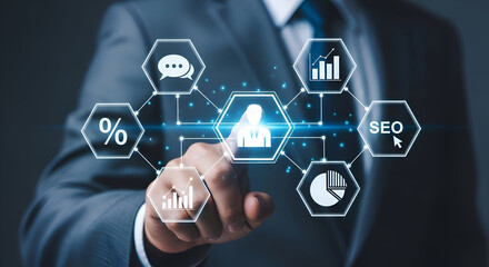 Businessman in suit interacting with virtual seo interface with various data analysis icons and graphs floating around his hand