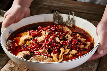 Boiling water and fragrant aroma of wild grass carp