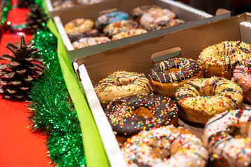 Festive Christmas Donuts with Colorful Icing and Holiday Decorations