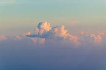 Golden sunset clouds towering high above tropical Lombok nature.