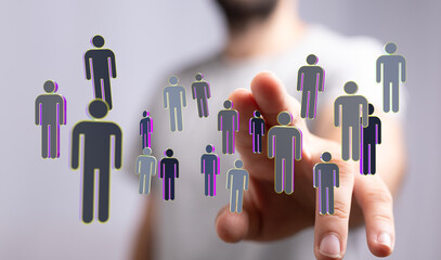 A hand interacting with virtual human icons, representing teamwork, collaboration, and community. Perfect for illustrating social networks, busi