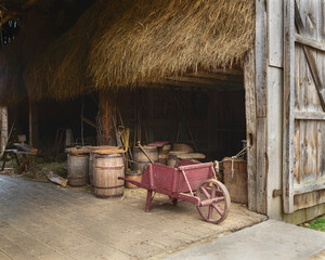 Vintage Red Wooden Wheelbarrow by Rustic Barn