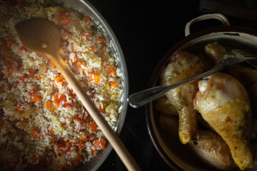 Cooking chicken and rice on the stove