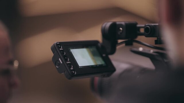 Close-up of a Camera Screen During a Video Production Scene of business interview