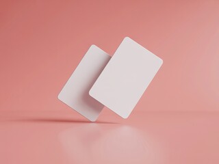 Two blank white floating cards mockup with elegant tropical palm leaf shadows on a pale pink studio background for luxury membership or gift certificates.