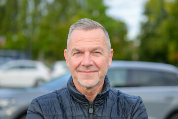 Mature Man Smiling At Camera
