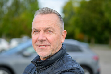 Confident Mature Man Smiling Outdoors