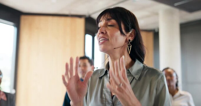 Speaker, workshop and business woman at seminar for motivational speech, presenter and coaching event. Corporate training, public speaking and leadership program with employees at expo for forum