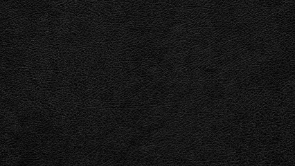 Abstract textured black leather background with small pattern for web banner template or wallpaper design.