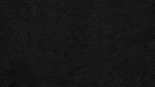 Abstract textured black leather background with small pattern for web banner template or wallpaper design.