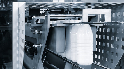 Machine for producing plastic beverage bottles using extrusion method from plastic