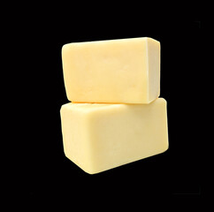 Piece of cheese isolated on a black background