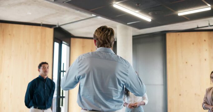 Advice, inspiration and microphone with motivational speaker man in office for life coaching. Business, crowd and speech with person in workplace for employee development, pep talk or support