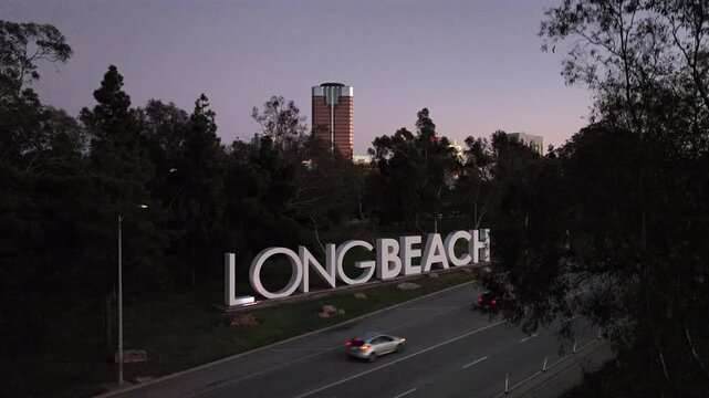 Long Beach, California, USA - Aerial View of the 'Long Beach' Sign in the Evening Showing the Downtown Area