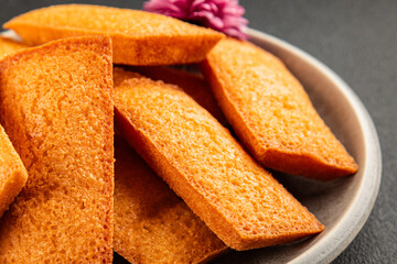 Financier biscuit cookie sweet dessert appetizer fresh tasty gourmet food table setting rustic food top view copy space