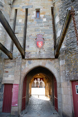 The impressive entrance door of the medieval castle of Vitr&eacute;, Brittany, France. Vertical shot.