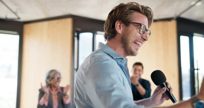 Applause, business and microphone with motivational speaker man in office for life coaching. Clapping, crowd and speech with person in workplace for employee development, pep talk or support