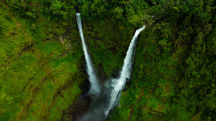 Zipline flights. Tad Fane waterfall in rainforest at Pakse and Champasak city Laos. Tour tourism and travel in Asia.