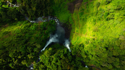 Zipline flights. Tad Fane waterfall in rainforest at Pakse and Champasak city Laos. Tour tourism and travel in Asia.