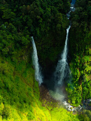 Zipline flights. Tad Fane waterfall in rainforest at Pakse and Champasak city Laos. Tour tourism and travel in Asia.