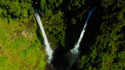 Zipline flights. Tad Fane waterfall in rainforest at Pakse and Champasak city Laos. Tour tourism and travel in Asia.