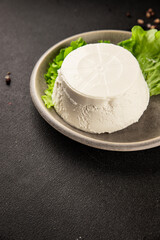 Cream cheese ricotta or mascarpone healthy food ingredient appetizer fresh delicious gourmet food table setting rustic food top view copy space