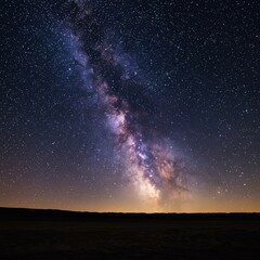 A breathtaking deep space view of a vibrant starry night sky showing the Milky Way galaxy over a dark, silhouetted landscape horizon ,nature ,milky way ,atmosphere