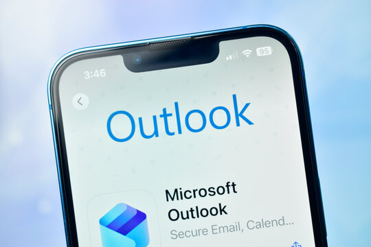 Closeup of microsoft outlook app icon and name displayed on a modern smartphone screen