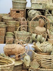 traditional mexican handmade wicker baskets and cute animal figurines in a market