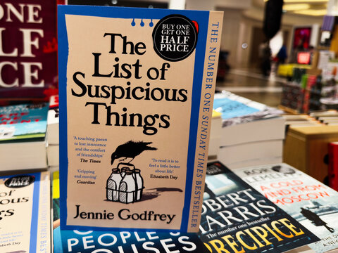 The List of Suspicious Things by Jennie Godfrey on a bookstore display with other titles